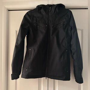 Like new condition ski jacket with snow blocker.